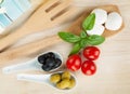 Mozzarella, olives, tomatoes and basil Royalty Free Stock Photo