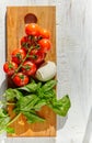 Mozzarella, organic cherry tomatoes and fresh basil Royalty Free Stock Photo