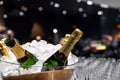 MoÃÂ«t & Chandon champagne tasting in event. Many glasses and bottles of champagne in to the ice
