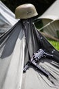 MP 40 and Helmet Hanging on a Tent