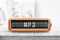 Mp3 message on a analog device in a bright room Royalty Free Stock Photo