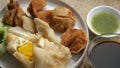 Mpek-Mpek Kapal Selam and Adaan with vinegar sauce and green chili in a cup. Royalty Free Stock Photo