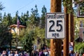 25 mph speed limit sign, attached to a wooden post Royalty Free Stock Photo