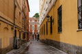 mpty narrow street with closed sidewalk cafe during pandemic of Covid-19 in Madrid Royalty Free Stock Photo