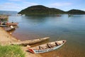 Fishermen and fishing boats with fish on the counter on Lake Tanganyika