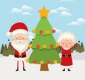 Mr and mrs santa claus with one christmas tree Royalty Free Stock Photo