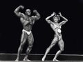 Mr. Olympia Lee Haney & Ms. Olympia Corey Everson Pose in Montreal in 1984 Royalty Free Stock Photo