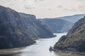 Mraconia Monastery, in Romania, taken from the Serbian part of Danube river in the Iron Gates Portile din Fier. Royalty Free Stock Photo