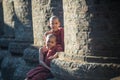 Mrauk U, MYANMAR - DEC 15, 2014: Young Novice monk and smile in Royalty Free Stock Photo