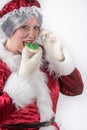 Mrs Clause has a cookie Royalty Free Stock Photo