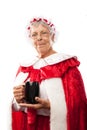 Mrs. Clause holding a cup Royalty Free Stock Photo