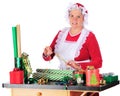 Mrs. Clause Wrapping Gifts Royalty Free Stock Photo