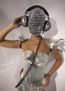 Mrs disco woman with sparkly face and headphones