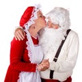 Mrs. Kissing Santa Claus Royalty Free Stock Photo