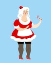 Mrs. Santa Claus and lollipop. Christmas woman and mints. f Royalty Free Stock Photo