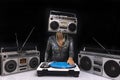 Woman with ghettoblaster as a head Djing