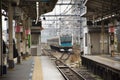 MRT Keihin-Tohoku Line JR East trains go to Ueno at Kamata Station in Tokyo, Japan