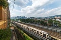 MRT tram rolling in front One Utama shopping mall Royalty Free Stock Photo