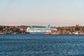 MS Galaxy in the archipelago between islands at sunset, heading to Stockholm from Turku