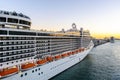 MSC Fantasia Cruise Ship docked at the Barcelona Cruise Port Terminal at sunset Royalty Free Stock Photo