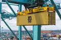 MSC owned container loaded by the gantry crane on the container ship.