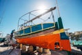 Msida, Malta - March 30, 2018: Worker repaired a fisherman`s boa