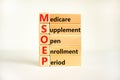 MSOEP symbol. Concept words MSOEP medicare supplement open enrollment period on wooden block. Beautiful white background. Medical