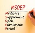 MSOEP symbol. Concept words MSOEP medicare supplement open enrollment period on white paper. Beautiful brown background. Medical