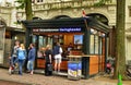 Msterdam, Holland, August 2019. A kiosk of herring sandwiches and other fresh fish. Some customers are queuing to be served while