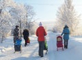 Mstyora,Russia-January 24,2013: Young mas and children on walk in winter Royalty Free Stock Photo