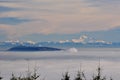 Mt Baker and Burnaby Mountain arising up from a sea of clouds