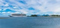 Mt Edgecumbe rises above Sitka with Viking cruise ship anchored Royalty Free Stock Photo
