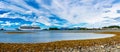 Mt Edgecumbe rises above Sitka with Viking cruise ship anchored Royalty Free Stock Photo