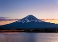 Mt. Fuji at dusk over Lake Kawaguchi in Japan. Generated AI Royalty Free Stock Photo