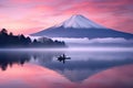 Mt Fuji and Lake Kawaguchiko at sunrise, Japan, Mt. Fuji or Fujisan with Silhouette three fishing people on boats and mist at