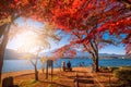 Mt. Fuji over Lake Kawaguchiko with autumn foliage and couple love at sunrise in Fujikawaguchiko, Japan Royalty Free Stock Photo