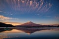 Mt. Fuji over Lake Kawaguchiko with autumn foliage at sunrise in Fujikawaguchiko, Japan Royalty Free Stock Photo