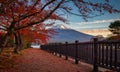 Mt. Fuji over Lake Kawaguchiko with autumn foliage at sunrise in Fujikawaguchiko, Japan Royalty Free Stock Photo