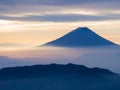 Mt. Fuji over the mist after sunrise