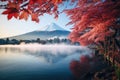 Mt Fuji with red maple leaf at Kawaguchiko lake in Japan, Colorful Autumn Season and Mount Fuji with morning fog and red leaves at Royalty Free Stock Photo