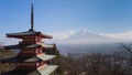 Mt. Fuji volcano viewed from behind red Chureito Pagoda Royalty Free Stock Photo