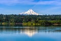 Mt Hood covered with snow over Hood River and reflecting on the Columbia River, Oregon. Shot taken from Washington state