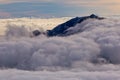 Kannongadake mountain peek above the clouds