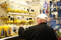 Elderly man shops for technology in store Royalty Free Stock Photo