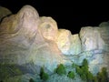 Mt. Rushmore sculpture of presidents by night