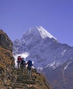 Mt. Thamserku and trekkers Royalty Free Stock Photo