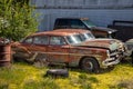 Old Hudson Hornet Sedan Car Parked and Rusting