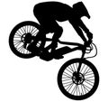 MTB downhill, enduro cross mountain biker doing an extreme jump on a mountain bike. MTB dh downhill mountain bike with helmet and