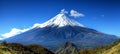 Mtfuji tallest volcano in tokyo, japan, snow capped peak in autumn with red trees, nature landscape