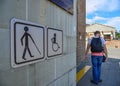 Public restroom signs with a disabled access symbol Royalty Free Stock Photo